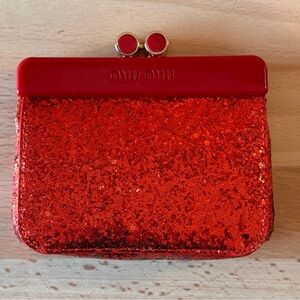Miu Miu red glitter mini pouch bag
